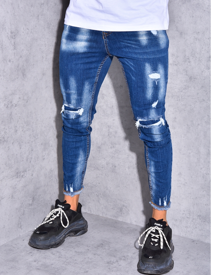 Jeans destroy effilochés aux chevilles