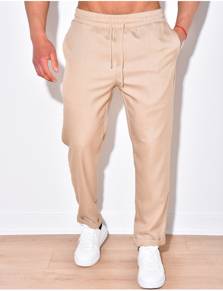 Trousers with elasticated belt