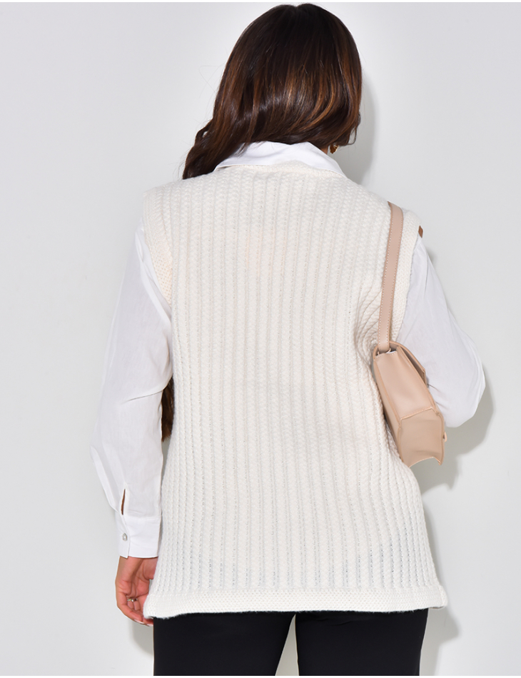  Sleeveless wool cardigan with gold buttons
