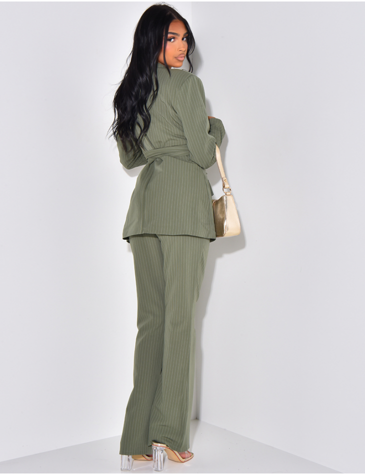 Striped suit with wide belt and flared trousers